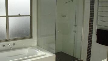 Bathtub, hair dryer, towels