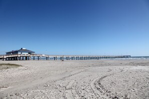 On the beach, sun-loungers