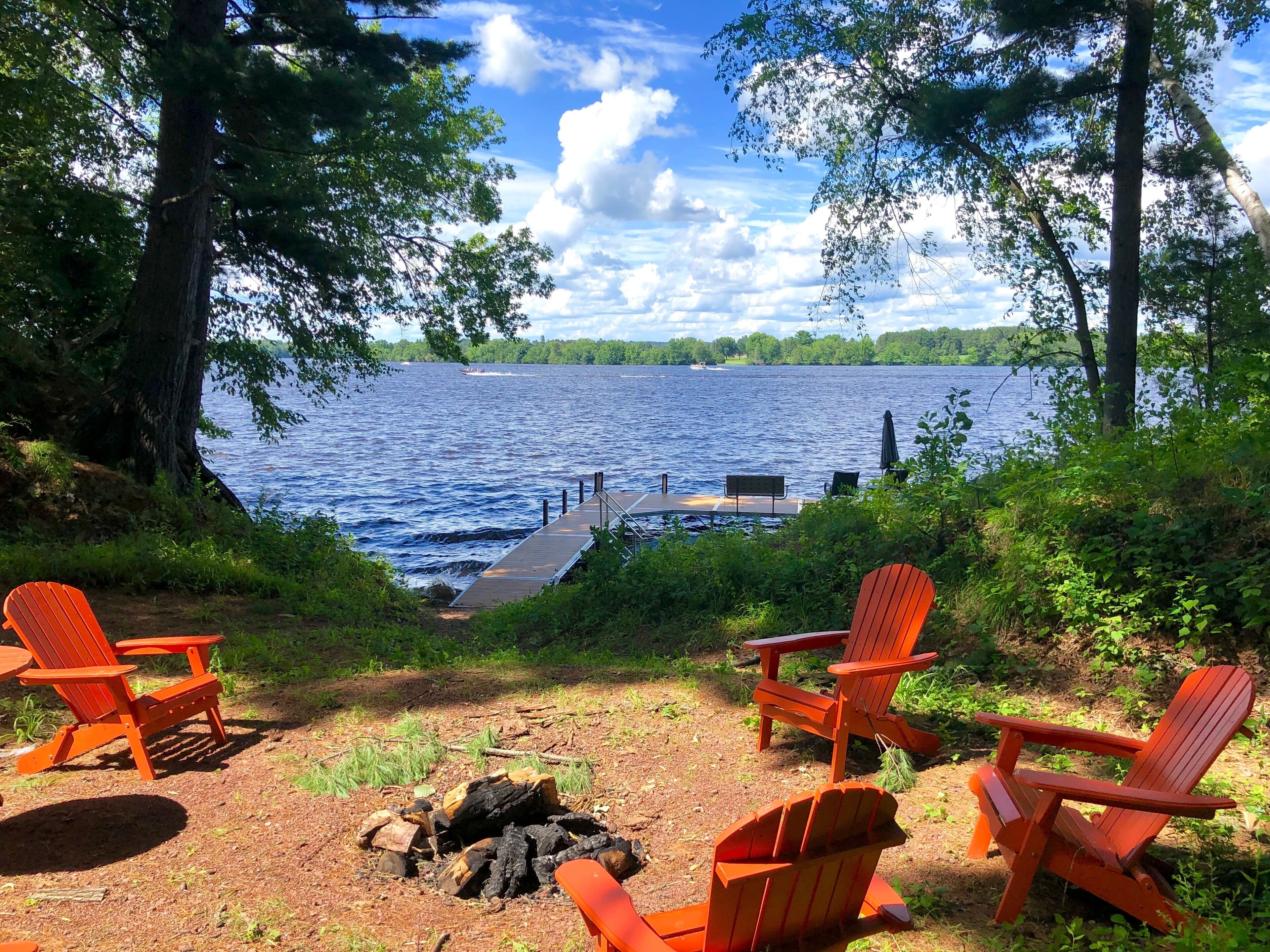 Fire pit with views of lake and dock