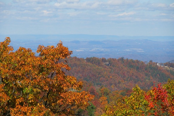 The autumn view from upper deck frames Pigeon Forge in the distance.