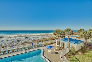 Outdoor pool, a heated pool - Gulf Front Sea Oats 303 with Rocker Recliner, Comfy beds and Beach Service!  (Fort Walton Beach)