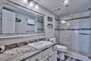 Combined shower/bathtub, hair dryer, towels, toilet paper - Gulf Front Sea Oats 303 with Rocker Recliner, Comfy beds and Beach Service!  (Fort Walton Beach)