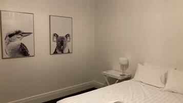 2 dormitorios, tabla de planchar con plancha, Internet y ropa de cama