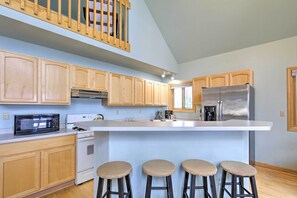 Fridge, microwave, stovetop, dishwasher - Cozy Dam Lake Escape w/ Dock, Yard & Water Access! (Eagle River)