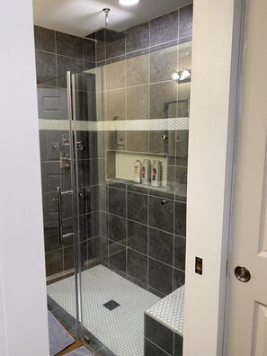 Bathtub, jetted tub, hair dryer, towels