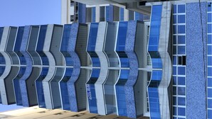 A modern building with a unique zigzag facade and large windows. - Apartment 702B with ocean view, Morro Beach, 3 bedrooms, 2 bathrooms, 1 garage. (Guarapari)