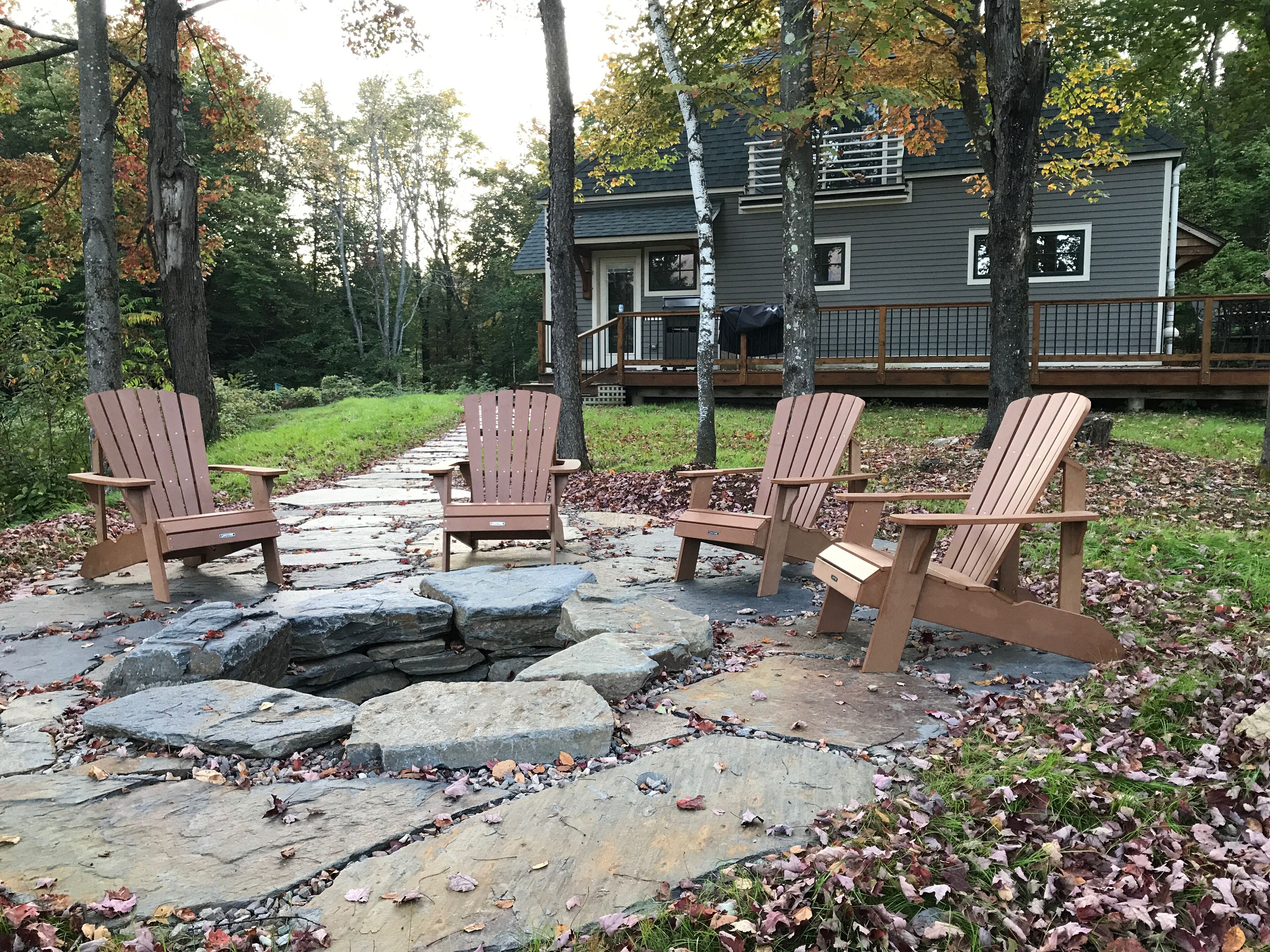 Relax in the Adirondack chairs by the firepit.