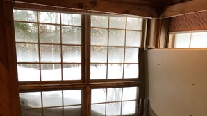 A hot tub in a wooden cabin with frosted windows. - Snowberry Hill, 5 bedroom, Private Luxury Ski Home on Killington Mtn, sleeps 12 (Killington)
