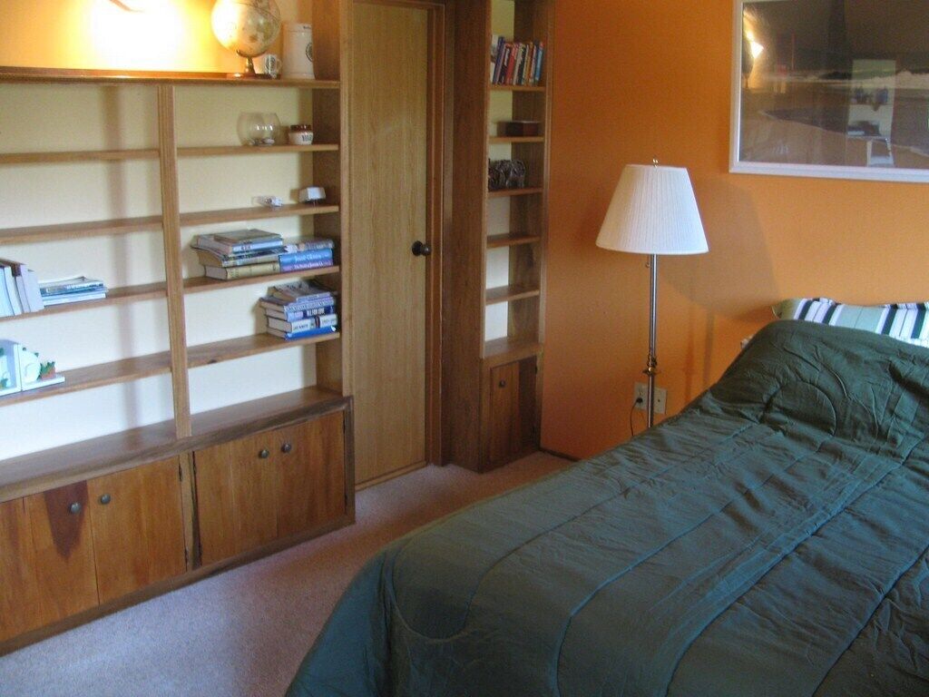 Queen Bedroom with adjacent bathroom.