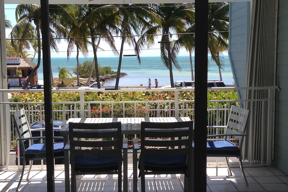The Jungle Breeze condo at LaBrisa Condominiums.<br>*Ocean View<br>*Free WiFi<br>* Free Covered Parking<br>* Final cleaning included in price<br>* KING size bed.<br>* Accommodates 2 adults<br>* Recently renovated this condo features all new flooring and a brand new kitchen<br>* Full size washer and dryer. <br><br>This is not a hotel; it is a privately owned condo facing the ocean with a view of swaying palms and turquoise waters. The Jungle Breeze condo is the perfect getaway for a romantic couple or a small family. The Jungle Breeze condo features a fabulous view of the ocean and the beach.<br><br>The road construction around the condominium property mentioned in reviews has been completed as of February 2022, there are still road construction projects happening around the island but none that affect this property. <br>Activities and Attractions : At Smathers beach you will find available such activities as windsurfing, sail boarding, snorkeling and kayak or Jet Ski tours. Old Town, Key West and Duval St are about 1mile away and there you will find dozens of restaurants, famous bars, art galleries, museums, live theater, boutique shopping and tours available on both land and sea. Key West is a bicycle friendly town and this is a great option for touring our small island of 2 miles by 4 miles.<br><br>Covid 19 : the mask order in Key West has been rescinded but you will find some businesses do require a mask to enter their premises so please always carry a mask with you. Residents of LaBrisa Condominiums may be required to wear a mask on the elevator if there have been reported cases of Covid on the property. <br>Thank you,<br>Pam MacKenzie Your Condo by the Beach with Ocean View