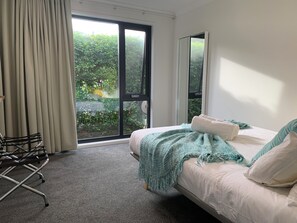 3 bedrooms, desk, iron/ironing board, travel cot