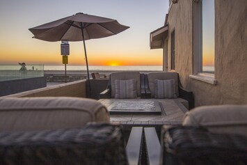 Beautiful sunsets on the deck looking out at the ocean from the fire pit.