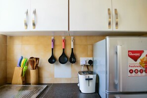 Microwave, oven, coffee/tea maker, cookware/dishes/utensils