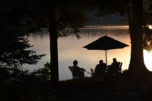 The Wee White Cottage on Tripp Lake in Poland, Maine.