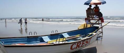 On the beach, sun loungers