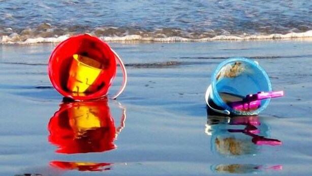 Two buckets on a wet beach with waves in the background. - FEEL THE FUN!! BEACH/OCEAN FRONT Clean & Modern 3-BR w/ Pool, Direct Ocean Views (Wildwood Crest)