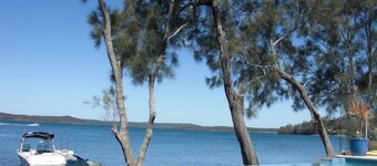 Luxury Waterfront Home with pool and spa family and pet friendly.