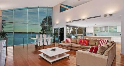 Luxury Waterfront Home with pool and spa family and pet friendly.