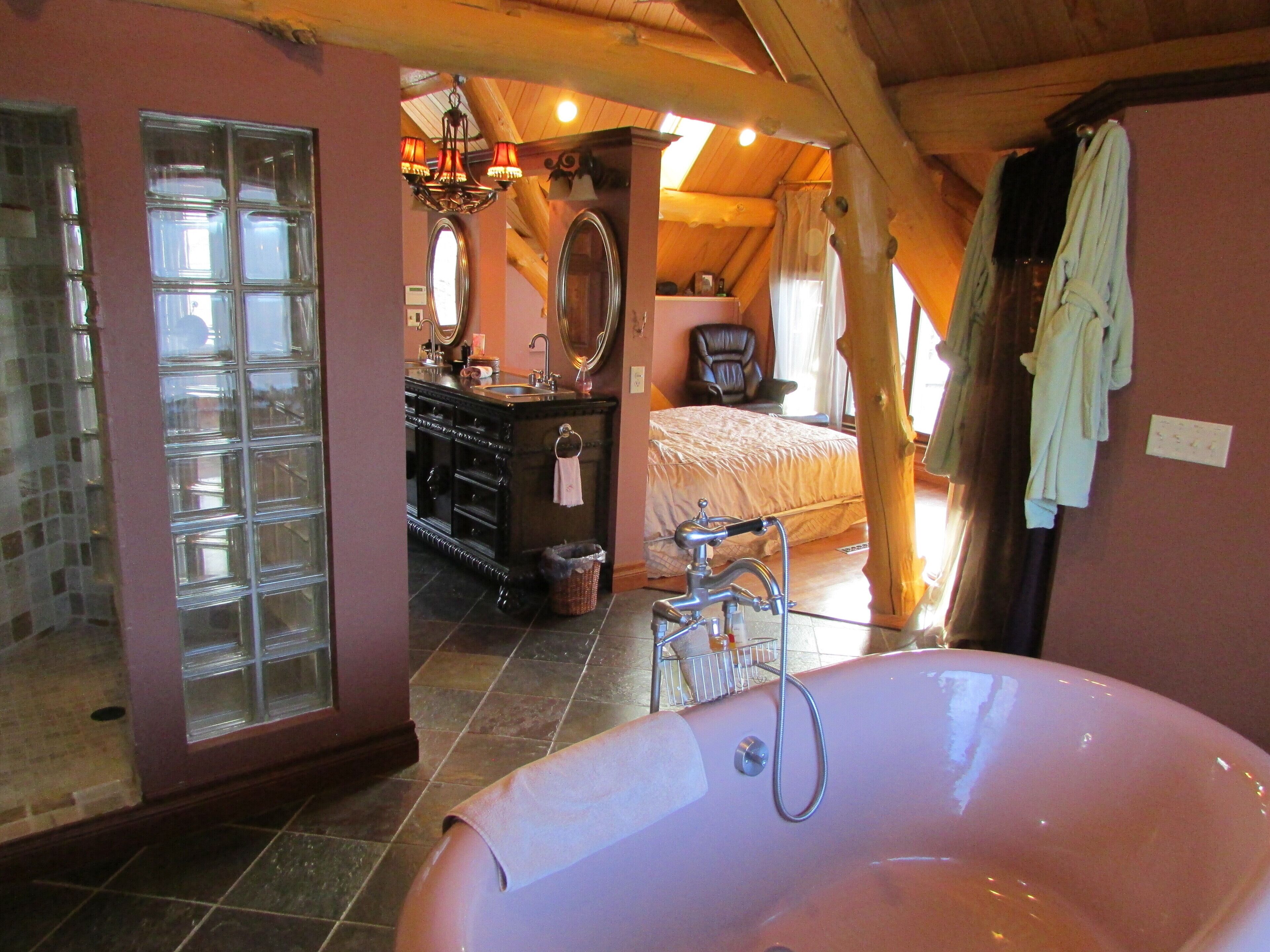 Premium log home on 600+ private wooded acres with private lake and waterfront