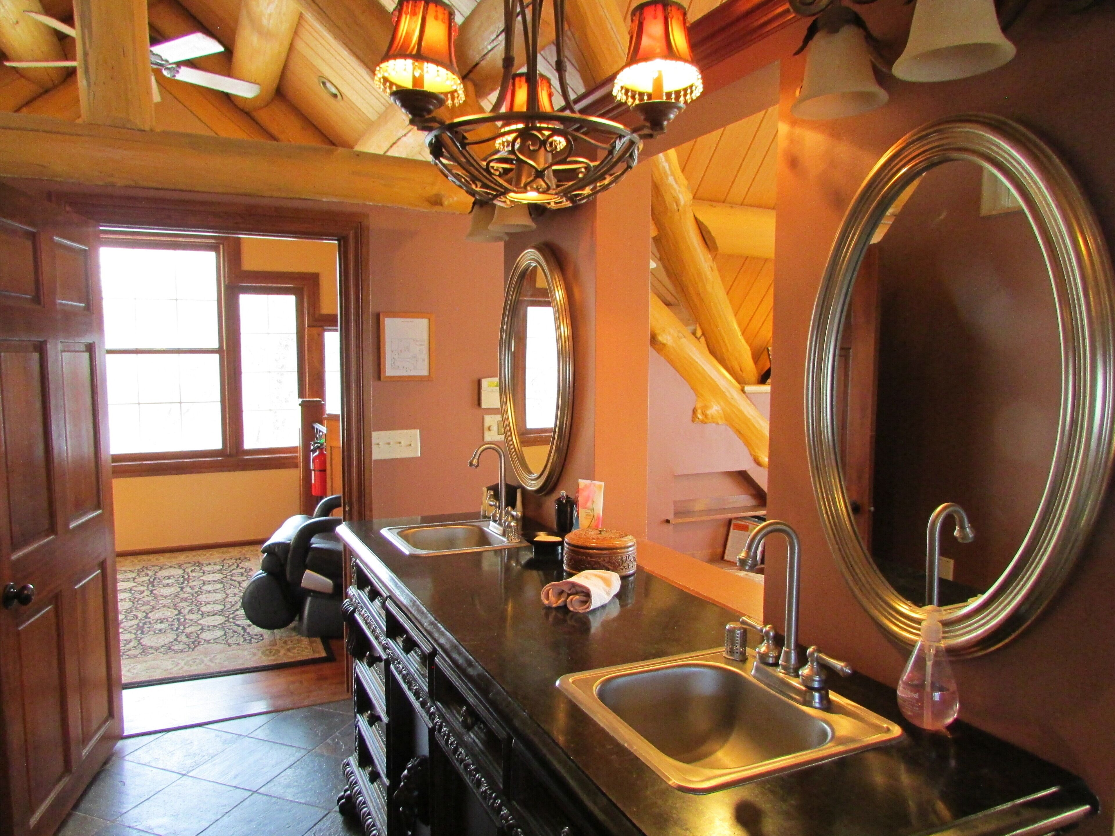 Premium log home on 600+ private wooded acres with private lake and waterfront