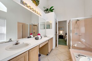 Combined shower/tub, hair dryer, towels, soap