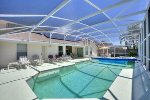 Outdoor pool, a heated pool - Secluded Luxury Pool Home, Close to Disney w/ Oversized pool Special offers now (Kissimmee)
