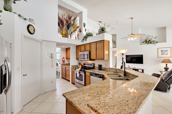 Fridge, microwave, oven, stovetop - Secluded Luxury Pool Home, Close to Disney w/ Oversized pool Special offers now (Kissimmee)