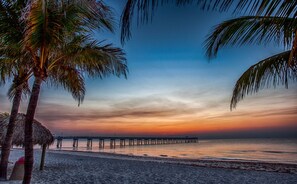 On the beach, sun-loungers, beach towels - Located steps from the ocean, offering true beach living. (Hollywood)