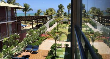 Beachfront village with natural pools near the condominium!