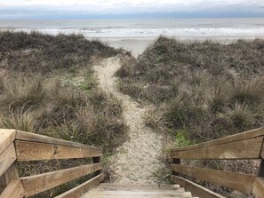 On the beach, sun loungers, beach towels