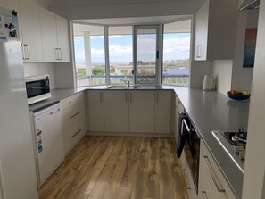 Fridge, microwave, oven, stovetop - Falcon Bayview Beach House (Falcon)