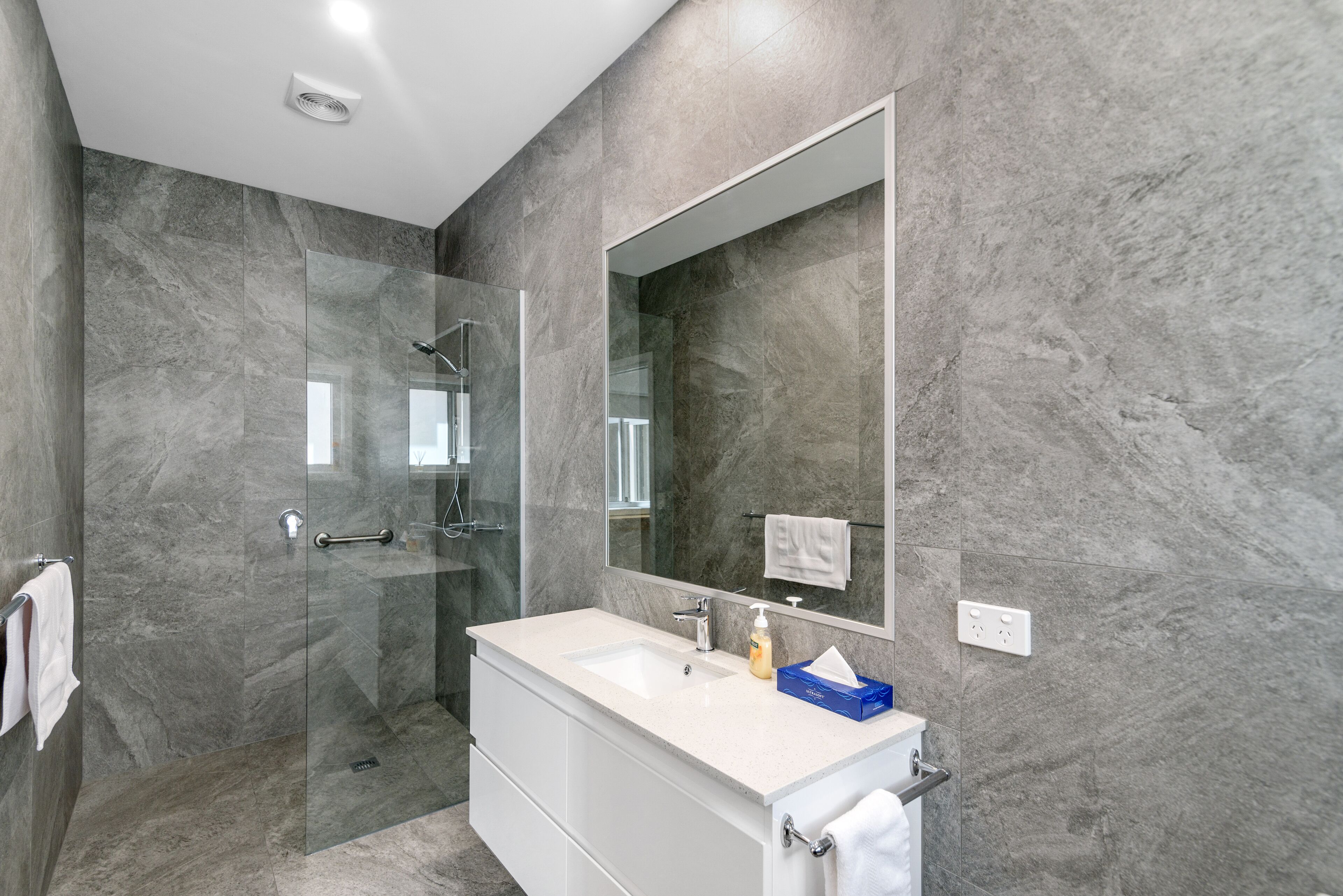 Bathtub, jetted bath, hair dryer, towels