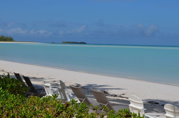 On the beach, sun-loungers, beach towels