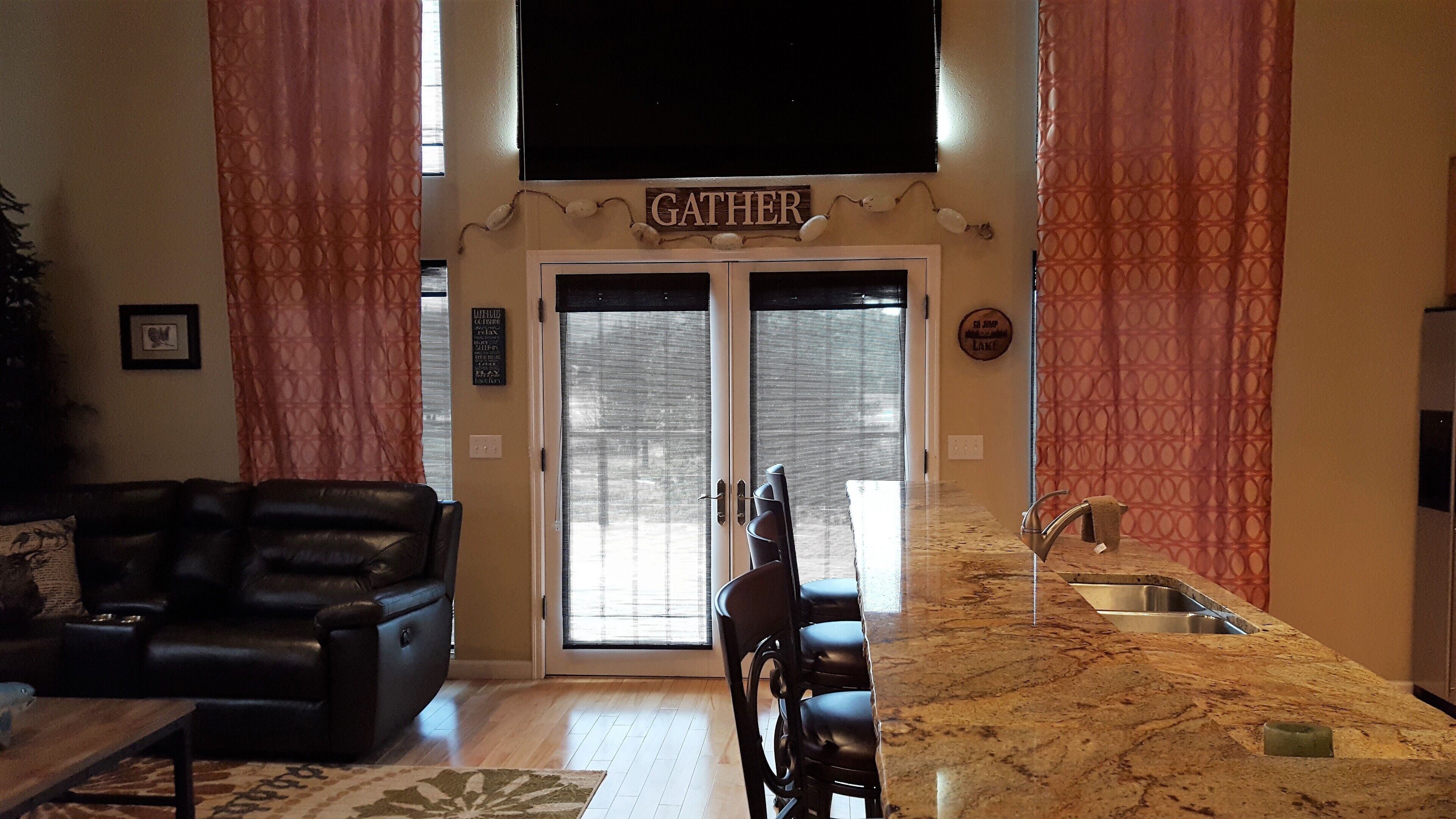 Waterfront Home with Large Deck, Movie Room, Firepit, Hot Tub & Private Dock!