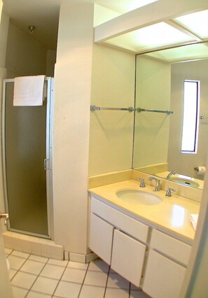 Combined shower/tub, hair dryer, towels, soap