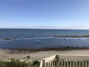 On the beach, sun-loungers