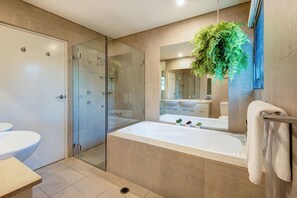 Bathtub, hair dryer, towels