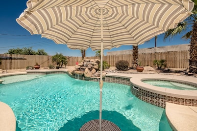 Resort-like backyard...jacuzzi, pool & waterfall!