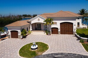 Exterior - Villa Laguna - Stunning Views! Elec & solar heated pool, spa on Gulf-access canal - SWFL Rentals (Cape Coral)