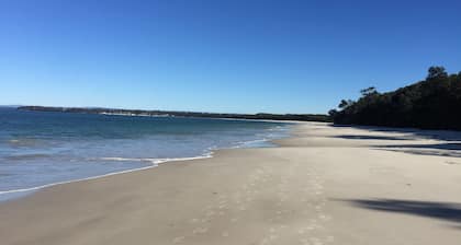 Large, fully equipped home with enclosed backyard. Perfect for families.