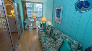 Smart TV, DVD player, books, video library - TROPICAL  2 BR/ 2 Ba, 77 Steps to BEACH  Unit #304/ 20% DISCOUNT / Dogs welcome! (Sanibel Island)