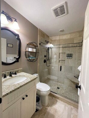 Shower, hair dryer, towels, soap