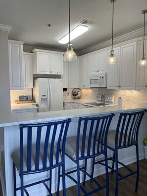 Fridge, microwave, oven, stovetop - CottageVacations4u "Beach Be With You"- ocean view- pool club-200 FT to beach! (Ocean Isle Beach)