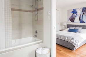 Bathtub, hair dryer, towels