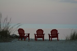 On the beach, sun-loungers, beach towels