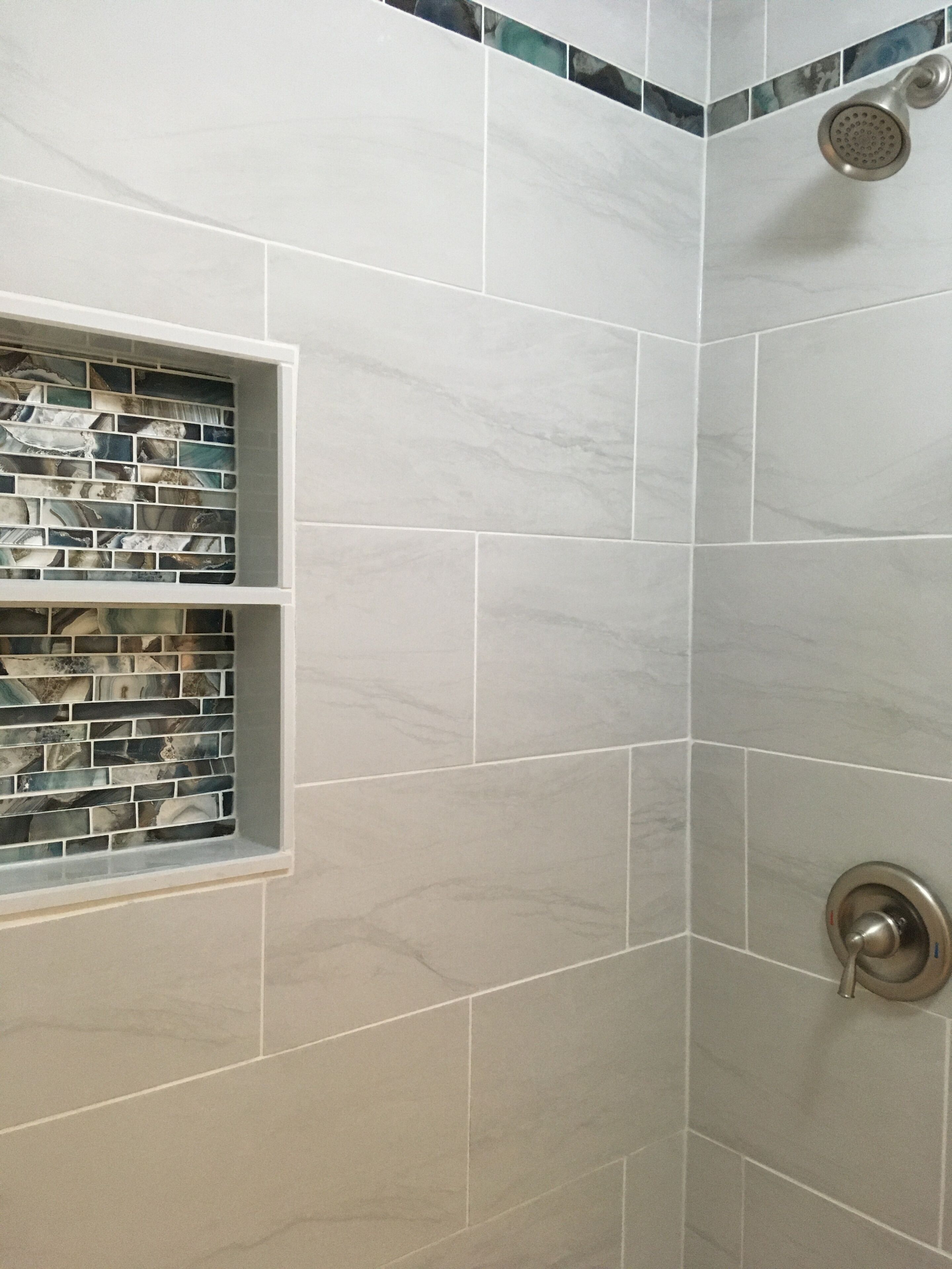 Combined shower/bathtub, hair dryer, towels, toilet paper