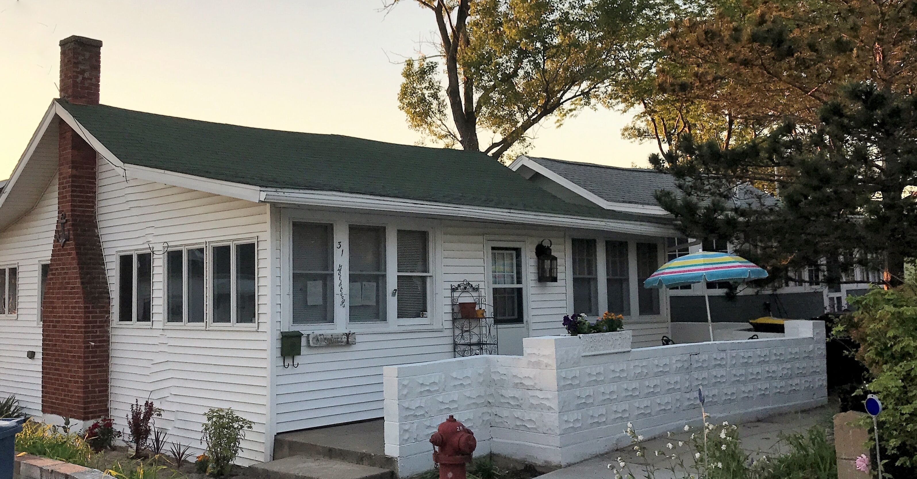 The Poplars. Cottage Life by the Big Blue Water.