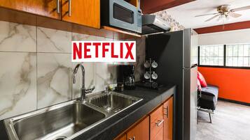 Fridge, microwave, stovetop, coffee/tea maker