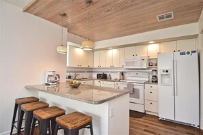 Fridge, microwave, oven, stovetop - Newly Refurnished Tropical Townhouse - Watch Dolphin in the Bay, Fish from the Docks! Unit B62 (Siesta Key)