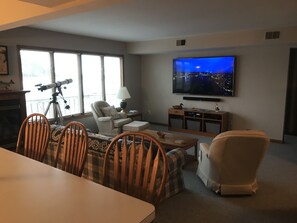 Smart TV, fireplace, books, printers